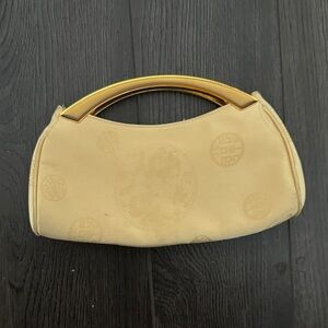 Elegant Cream Handbag with Gold Handle